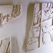 A wall with many different types of plaster.