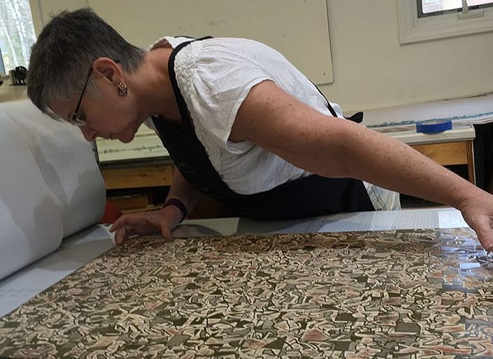 A person working on a table top